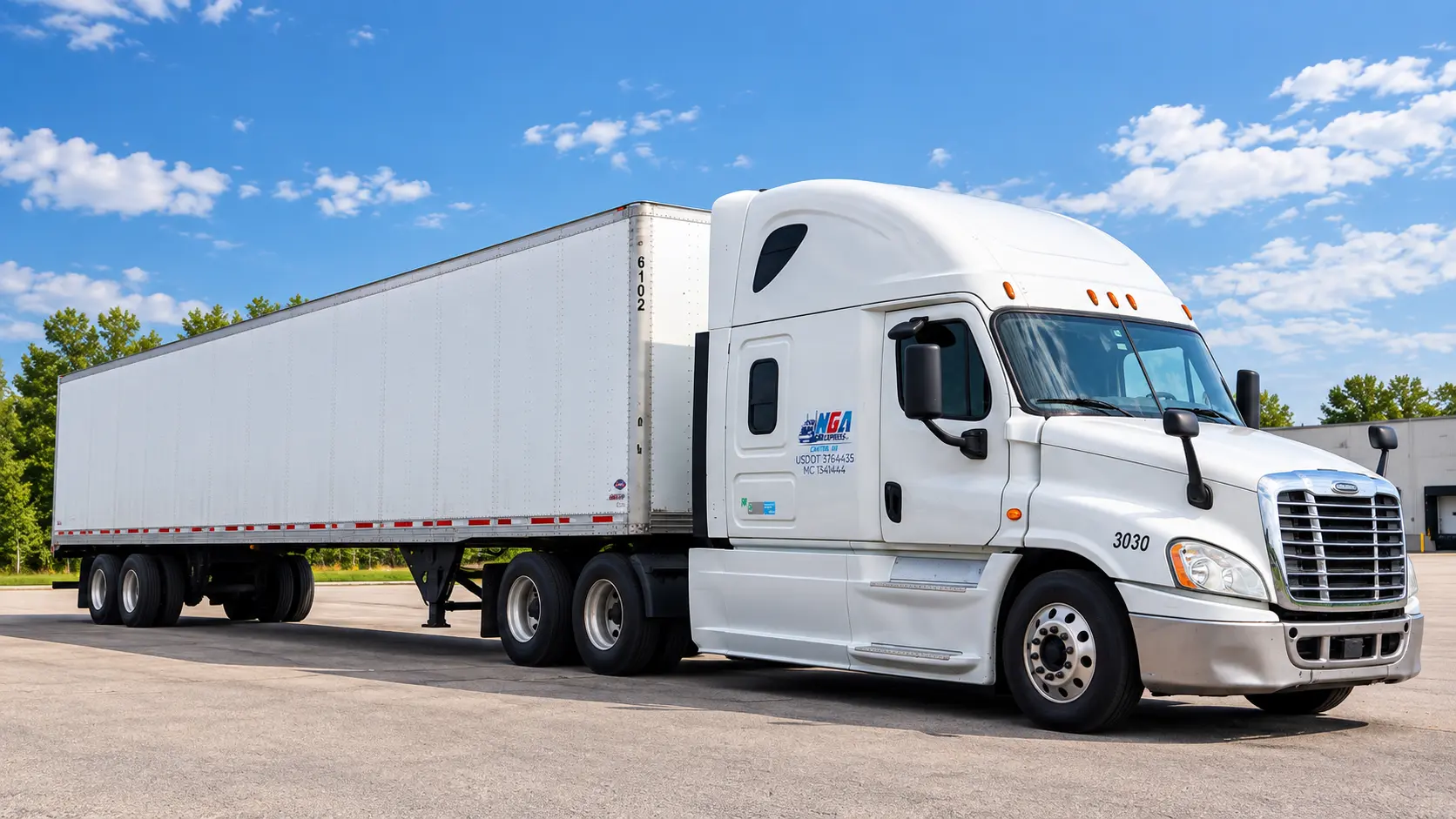 NGA Express tractor and dry van trailer parked under a bright Midwest sky.